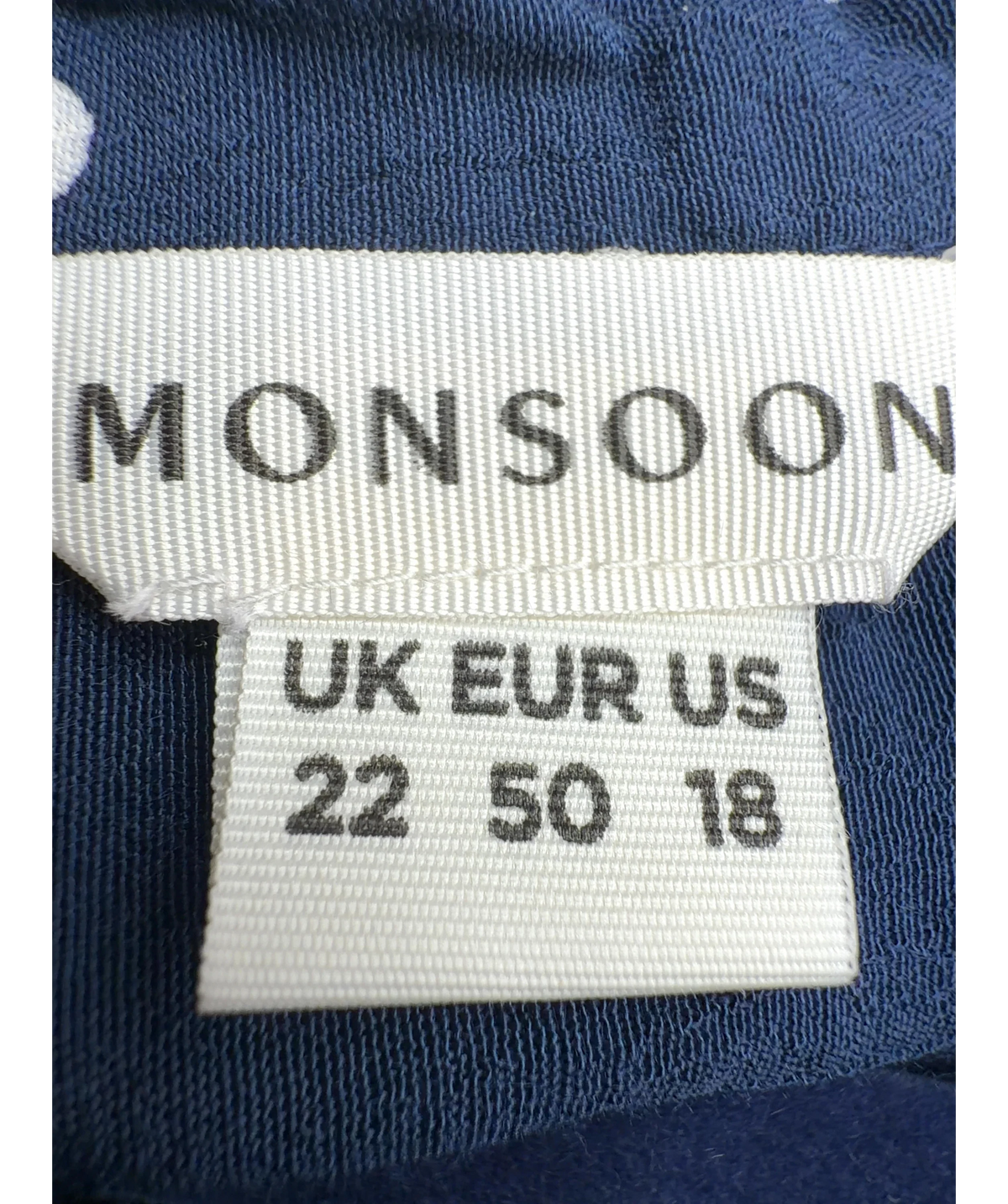 Monsoon navy polka-dot long-sleeved shirt, size UK 22 — care label