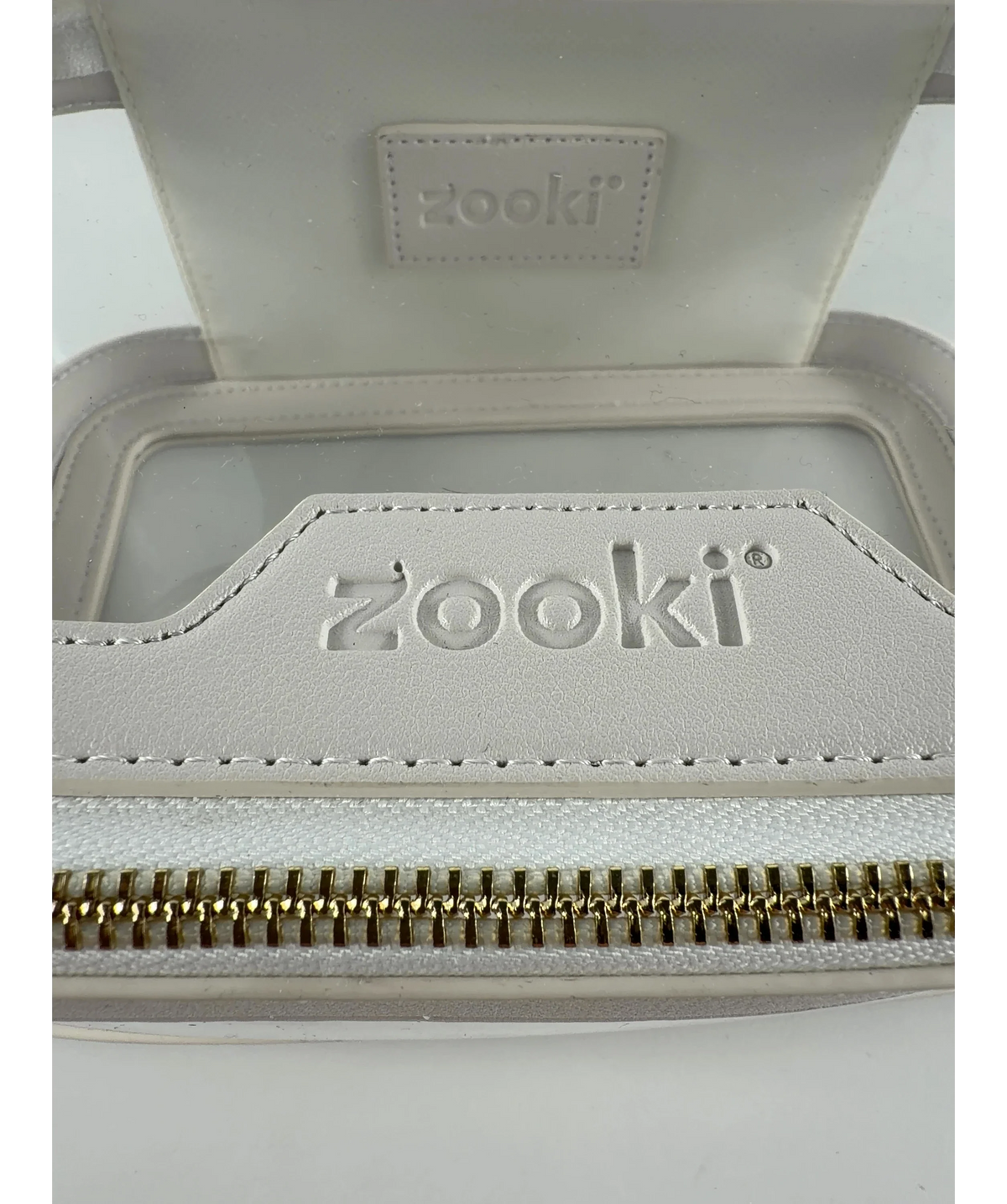 Zooki white clear travel cosmetic bag — label