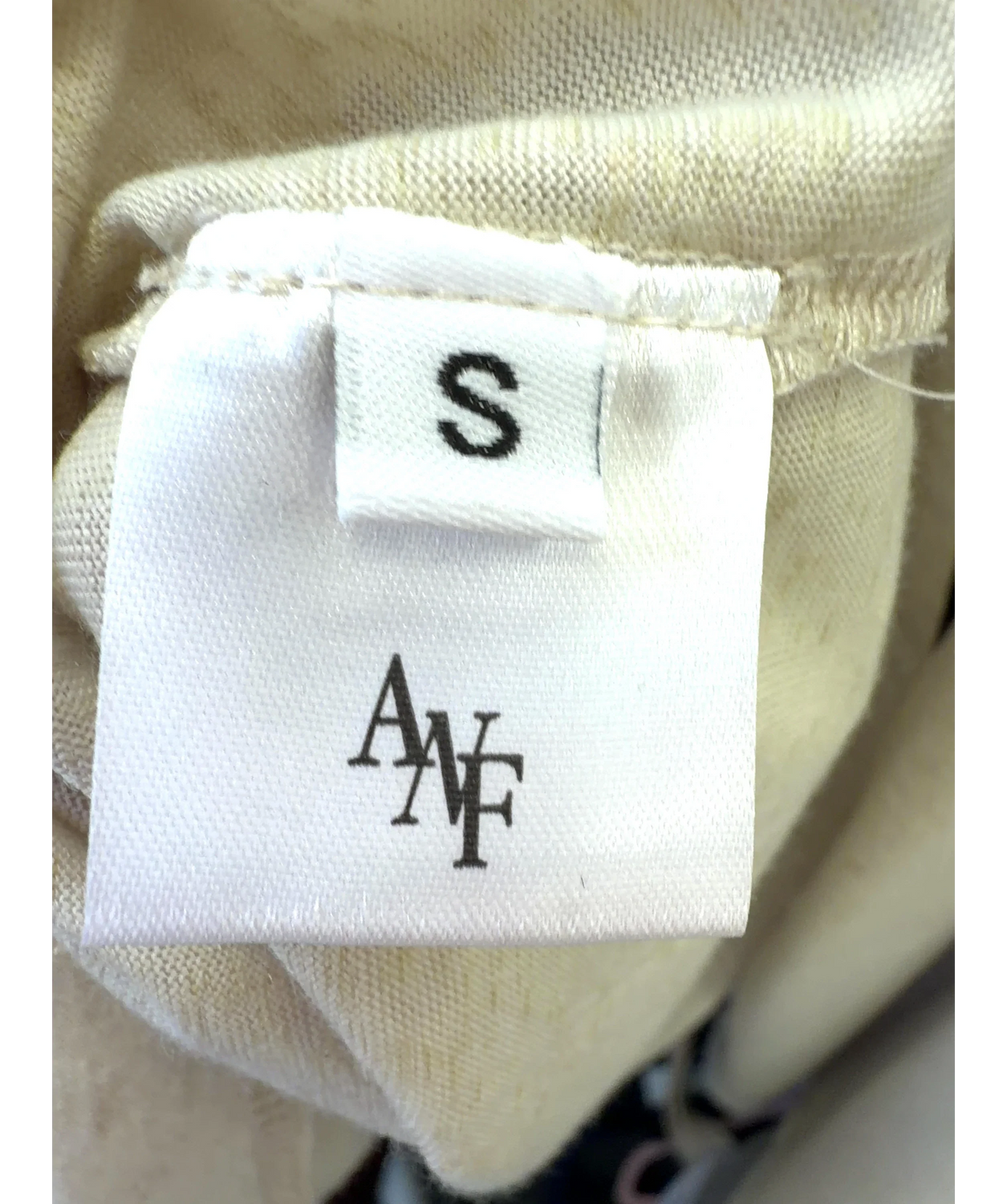 ATELIER NINETY FIVE Beige Relaxed-Fit Long-Sleeve Jersey Top, size UK S — care label