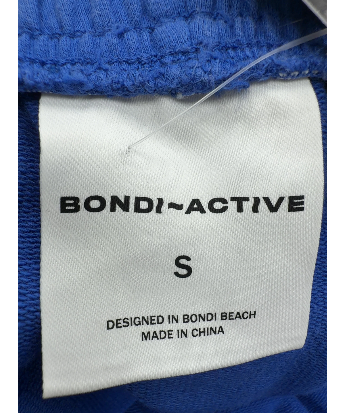Bondi Born Blue relaxed blue cotton shorts, size UK S — detail