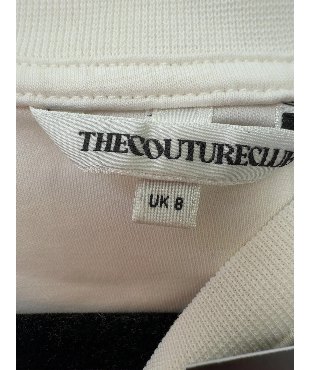 The Couture Club Cream Shoulder Pad Long Sleeve T-Shirt, size UK 8 — care label
