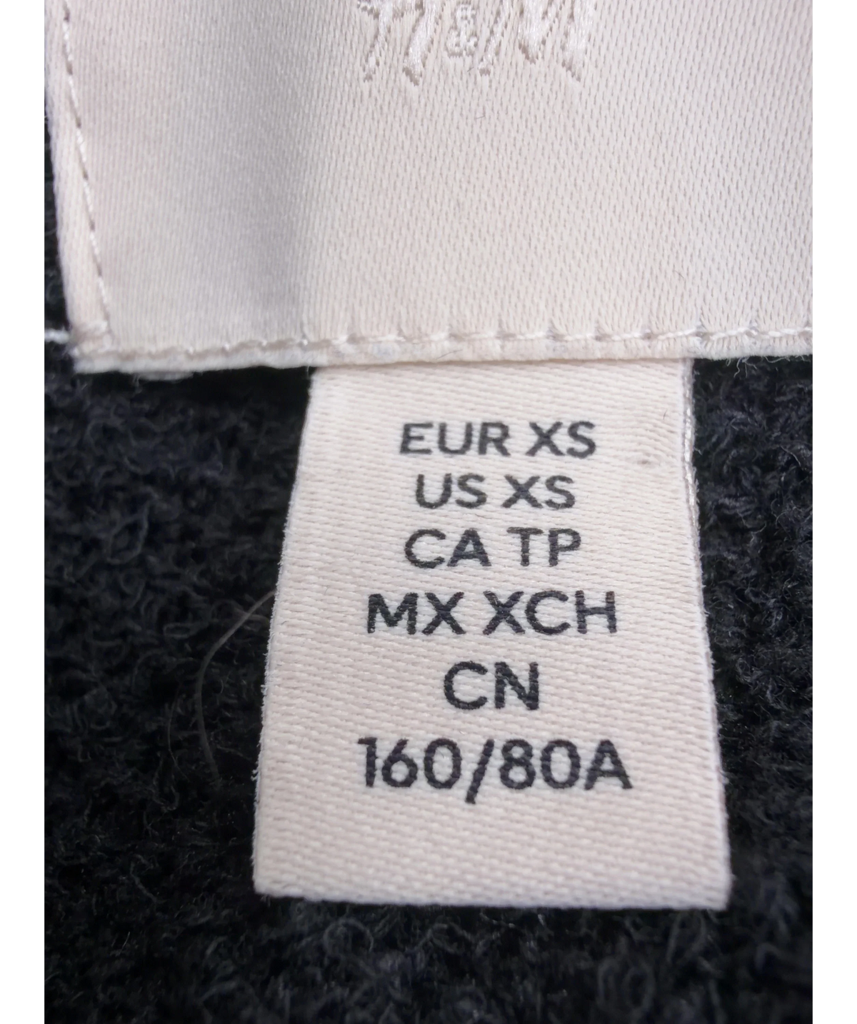 H&M Black Colour, size UK XS — care label