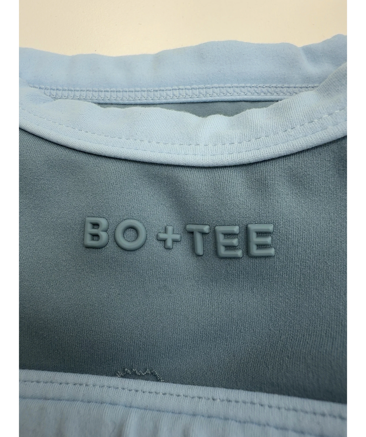 Bo + Tee Blue Soft Active Scoop Neck Sports Bra and Soft Active Pocket V-Waist Mini Shorts, size UK XS/S — detail