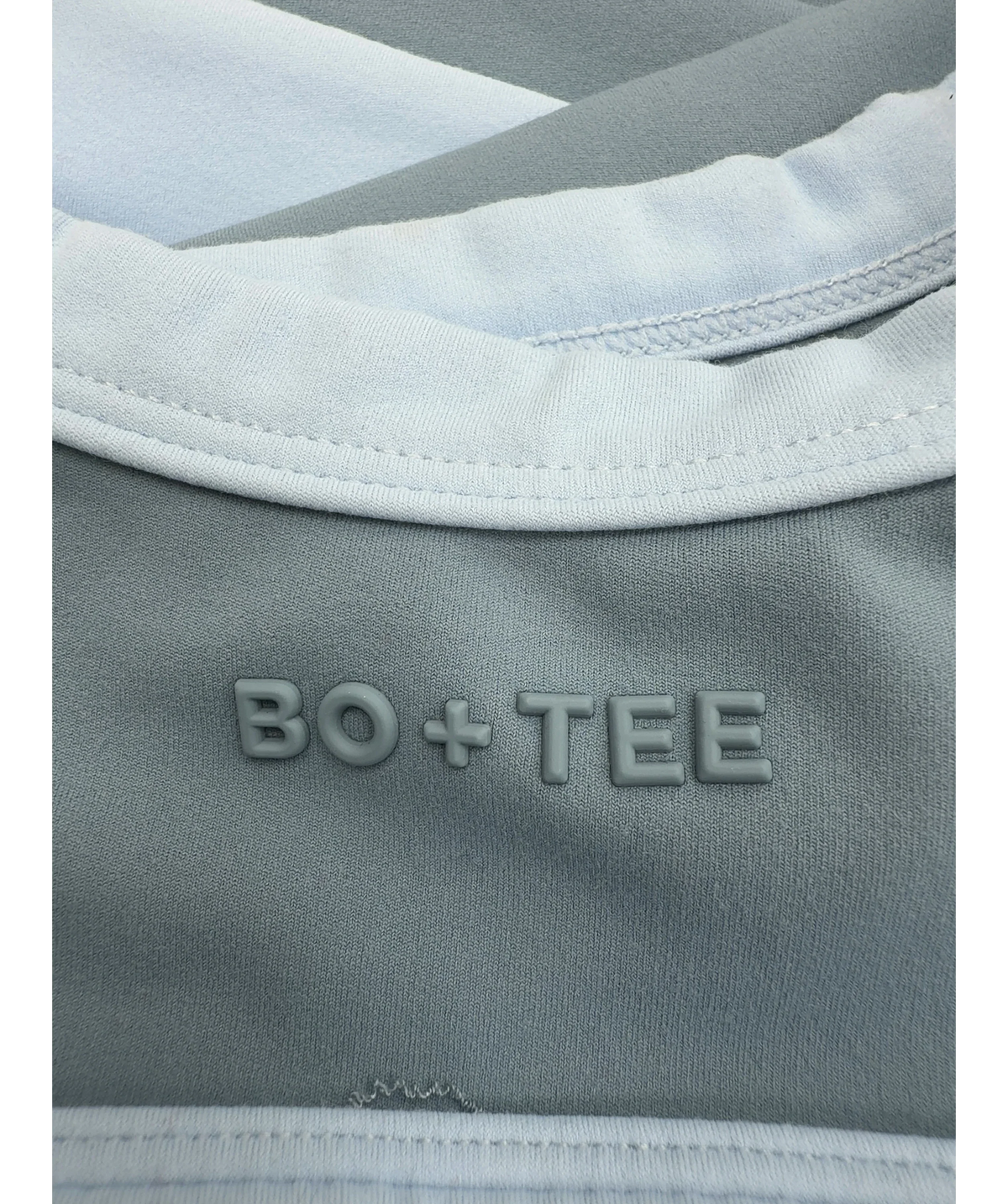 Bo + Tee Blue Soft Active Scoop Neck Sports Bra and Soft Active Pocket V-Waist Mini Shorts, size UK XS/S — label