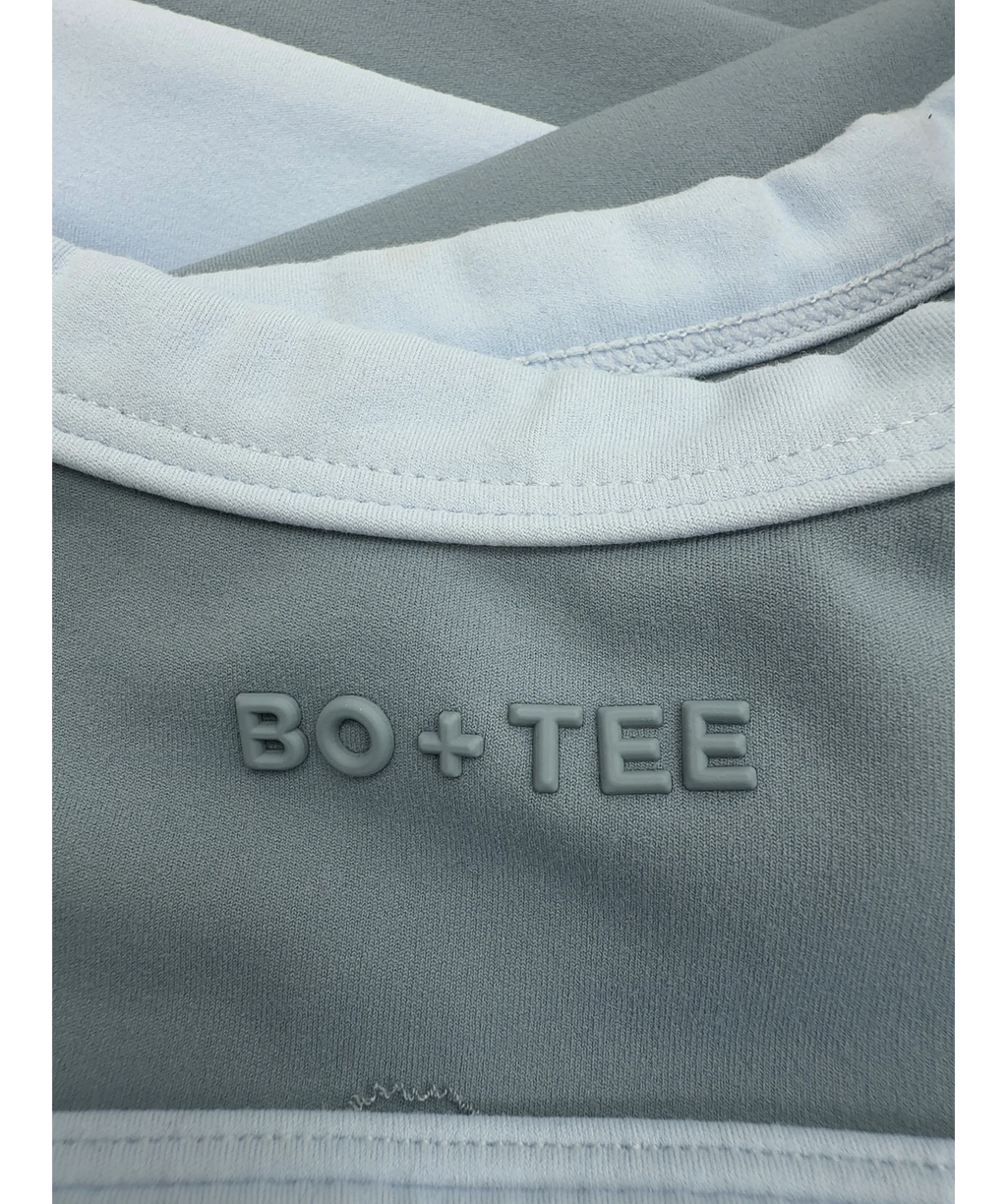 Bo + Tee Blue Soft Active Scoop Neck Sports Bra and Soft Active Pocket V-Waist Mini Shorts, size UK XS/S — care label