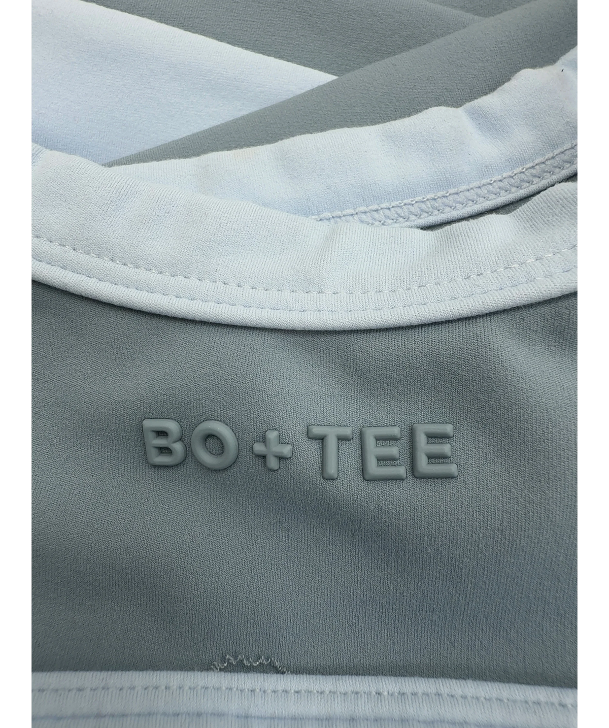 Bo + Tee Blue Soft Active Scoop Neck Sports Bra and Soft Active Pocket V-Waist Mini Shorts, size UK XS/S — care label