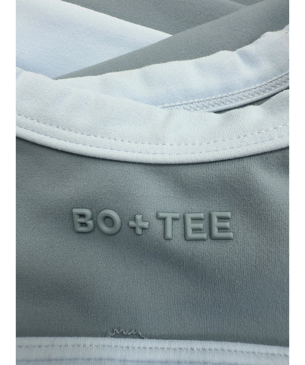 Bo + Tee Blue Soft Active Scoop Neck Sports Bra and Soft Active Pocket V-Waist Mini Shorts, size UK XS/S — fabric detail