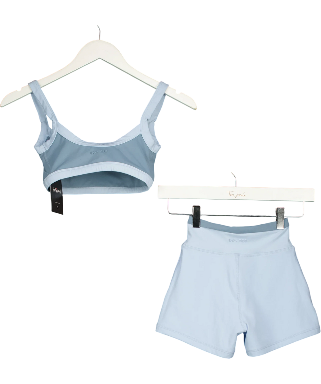 Bo + Tee Blue Soft Active Scoop Neck Sports Bra and Soft Active Pocket V-Waist Mini Shorts, size UK XS/S — back