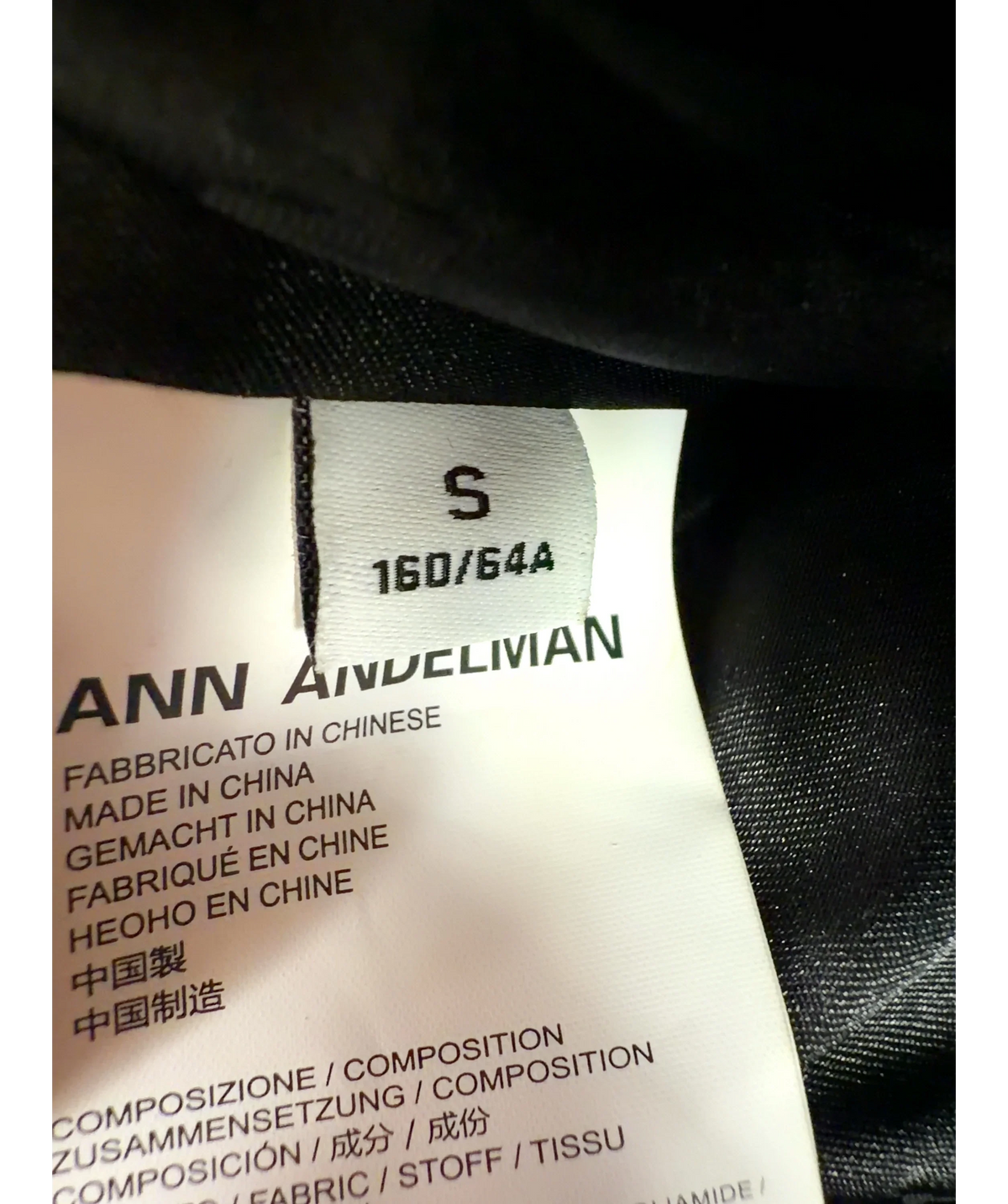 ANN ANDELMAN Black lace-up faux leather and striped ruffle skirt, size UK S — care label