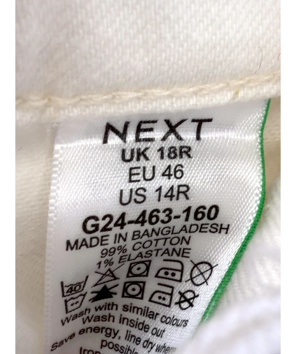 Next Cream high-rise flare jeans, size UK 18 — care label