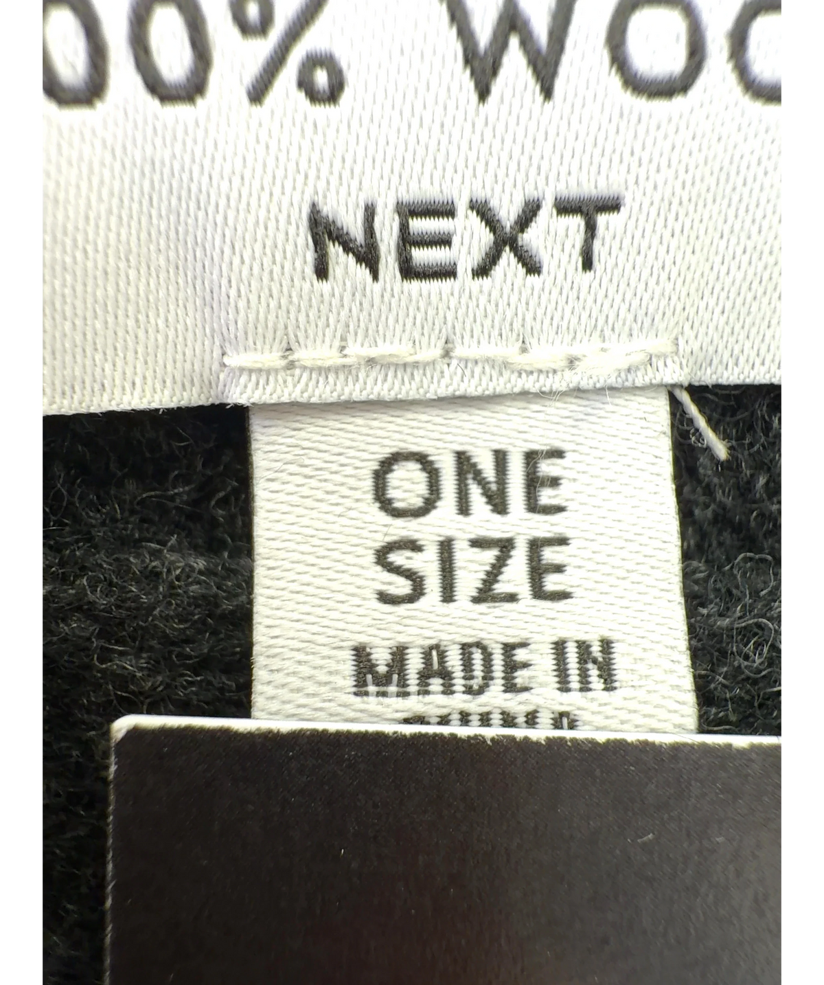 Next Black cropped draped poncho — care label