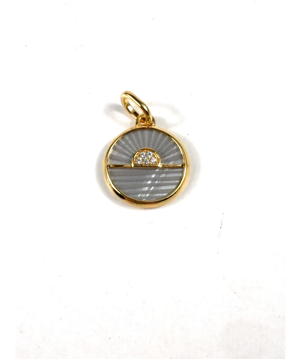 ALE MET (Pandora) gold sunburst/sunrise disc pendant — care label