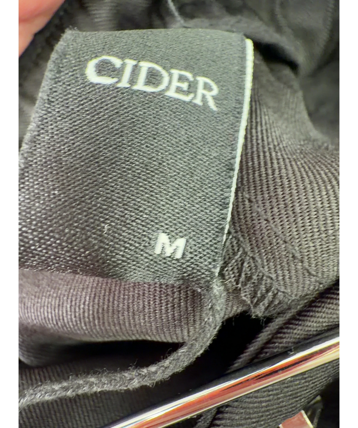 Cider Black pleated front trousers, size UK M — care label