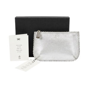 Anya Hindmarch Scalloped Edge Mini Zip Pouch / Clutch in metallic silver leather.