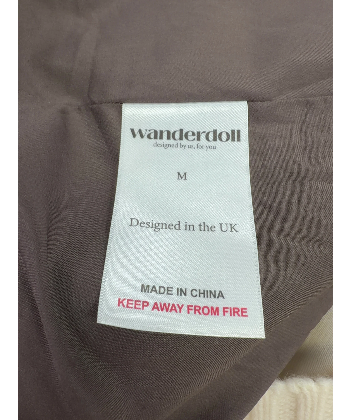 WANDERDOLL Brown Colour, size UK M — care label