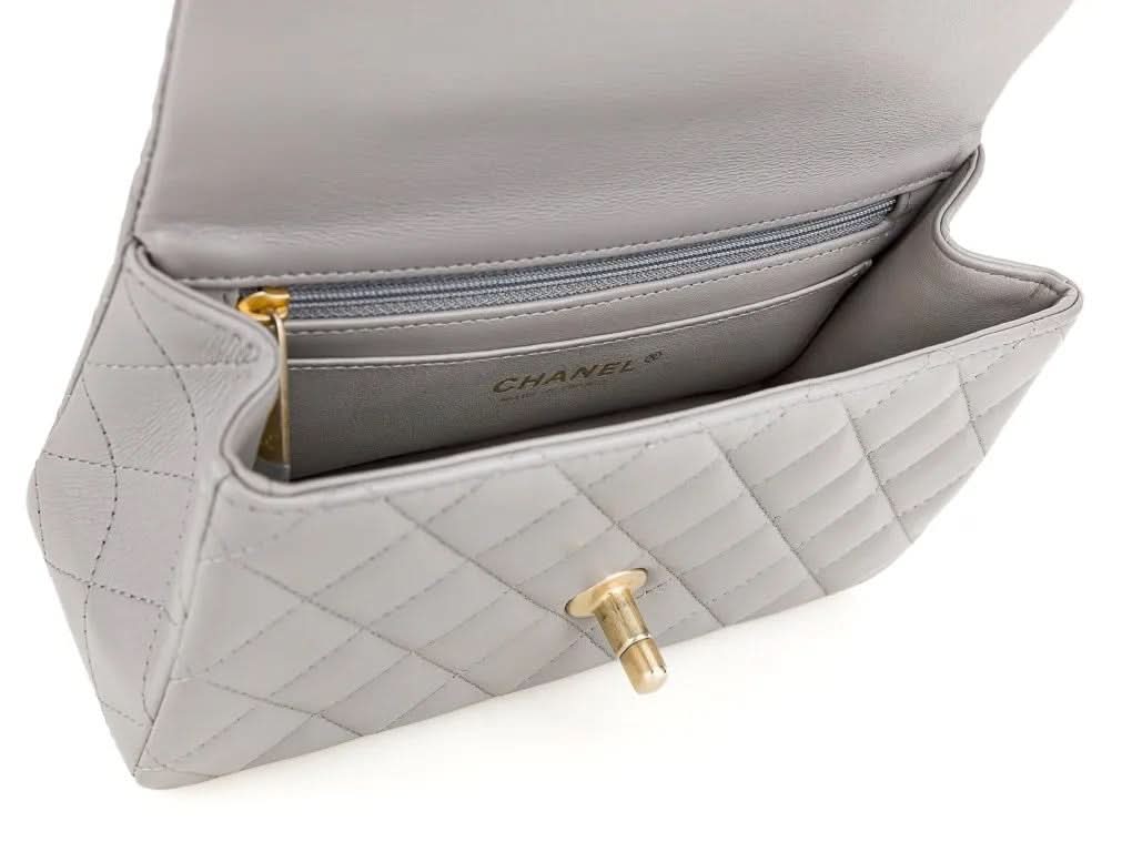 CHANEL 22B Grey quilted Lambskin / Antique Gold Metal Logo Top Handle Mini Flap Bag