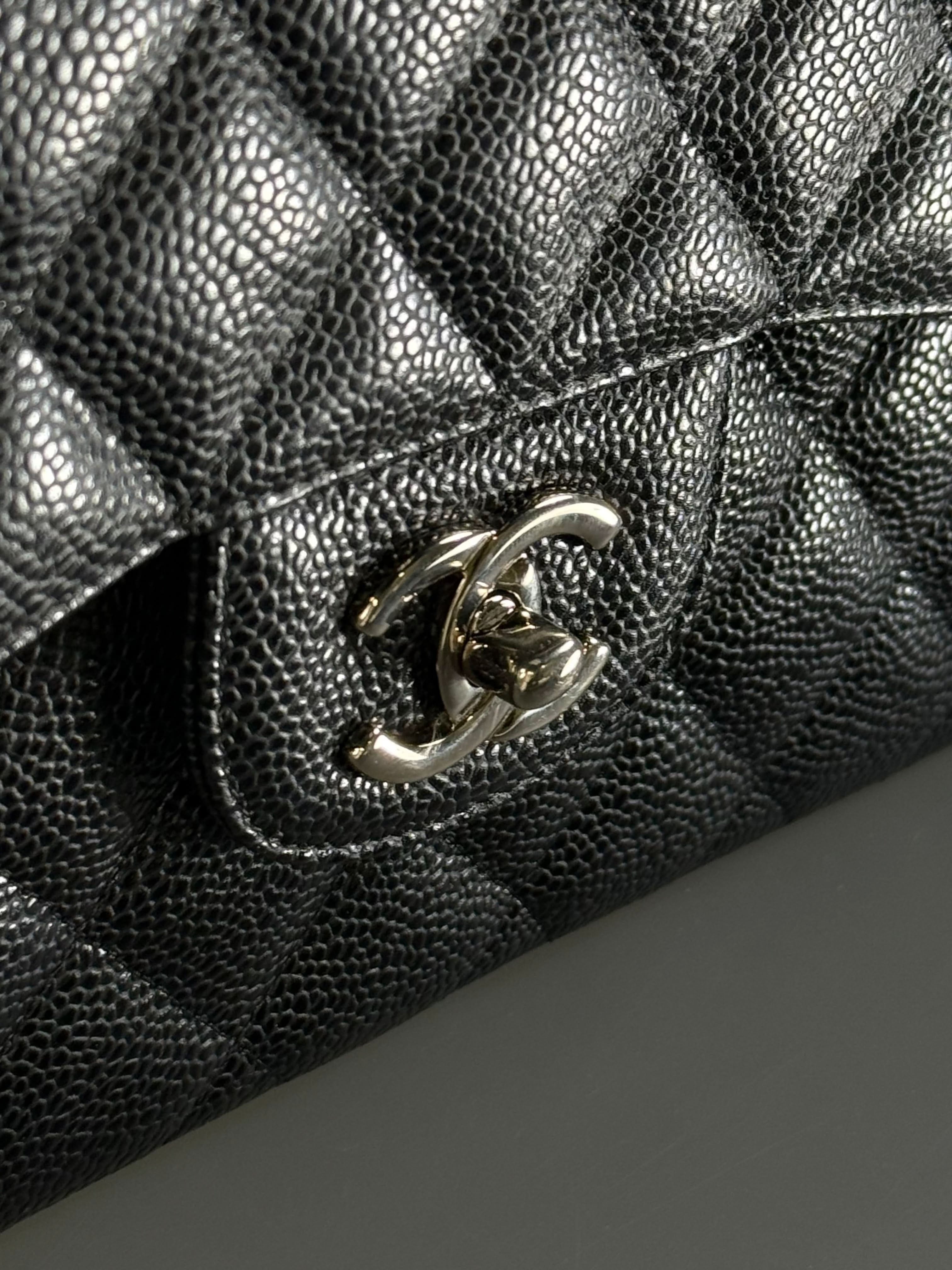 CHANEL Black Jumbo Classic Double Flap Bag in Caviar Leather with Silver Hardware