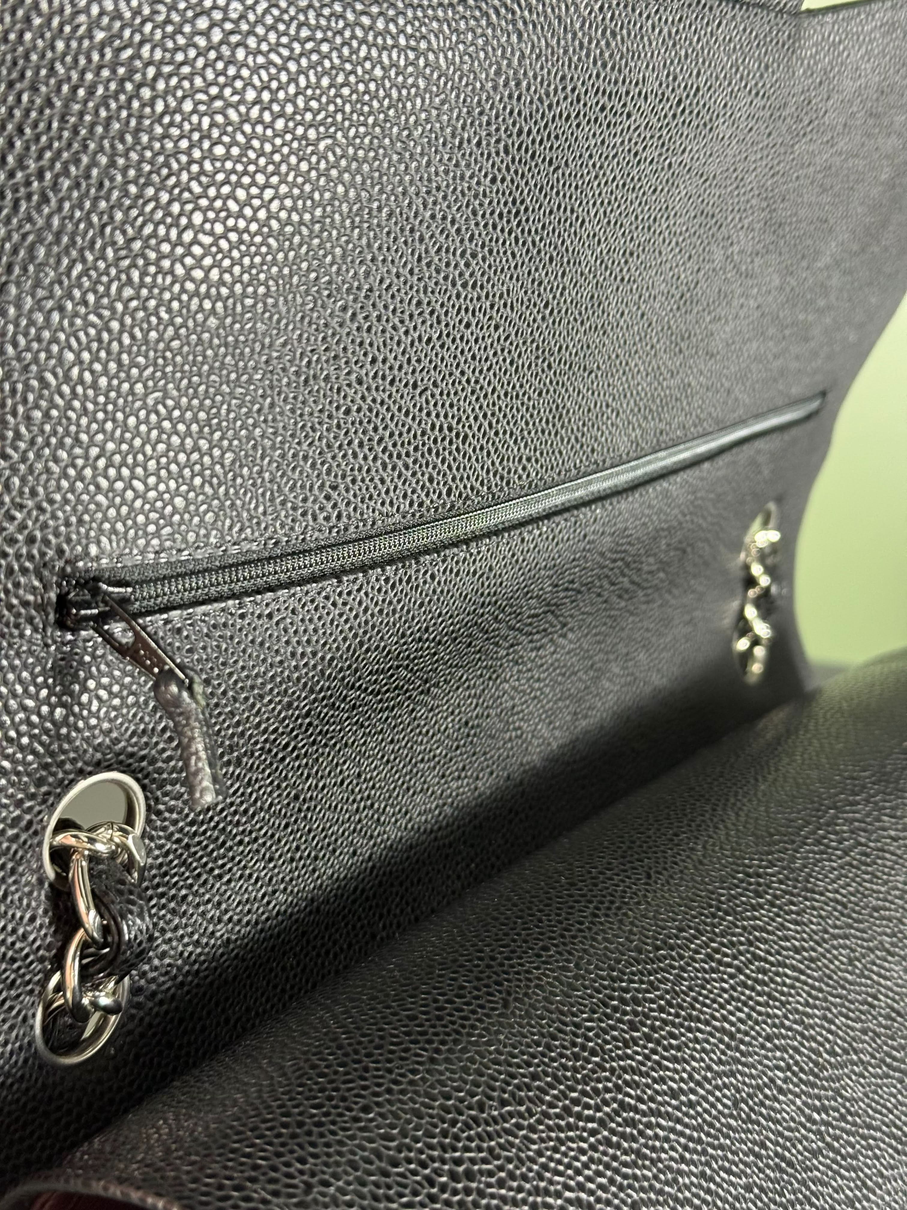 CHANEL Black Jumbo Classic Double Flap Bag in Caviar Leather with Silver Hardware