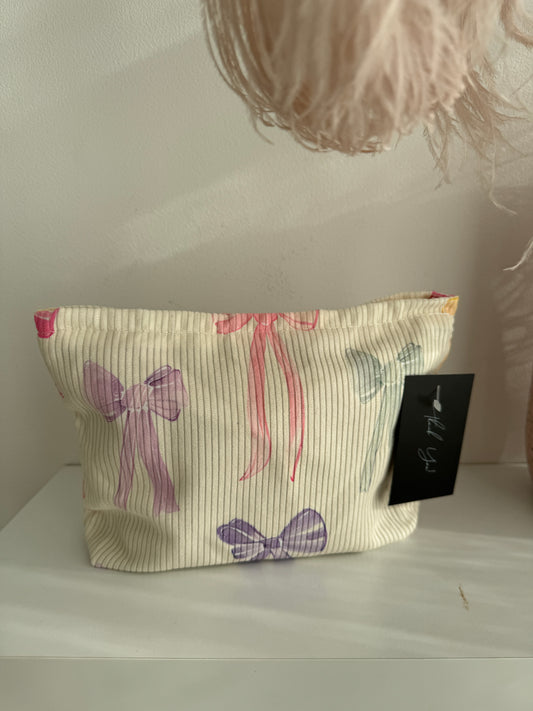 Cream Bow Print Cosmetic Bag