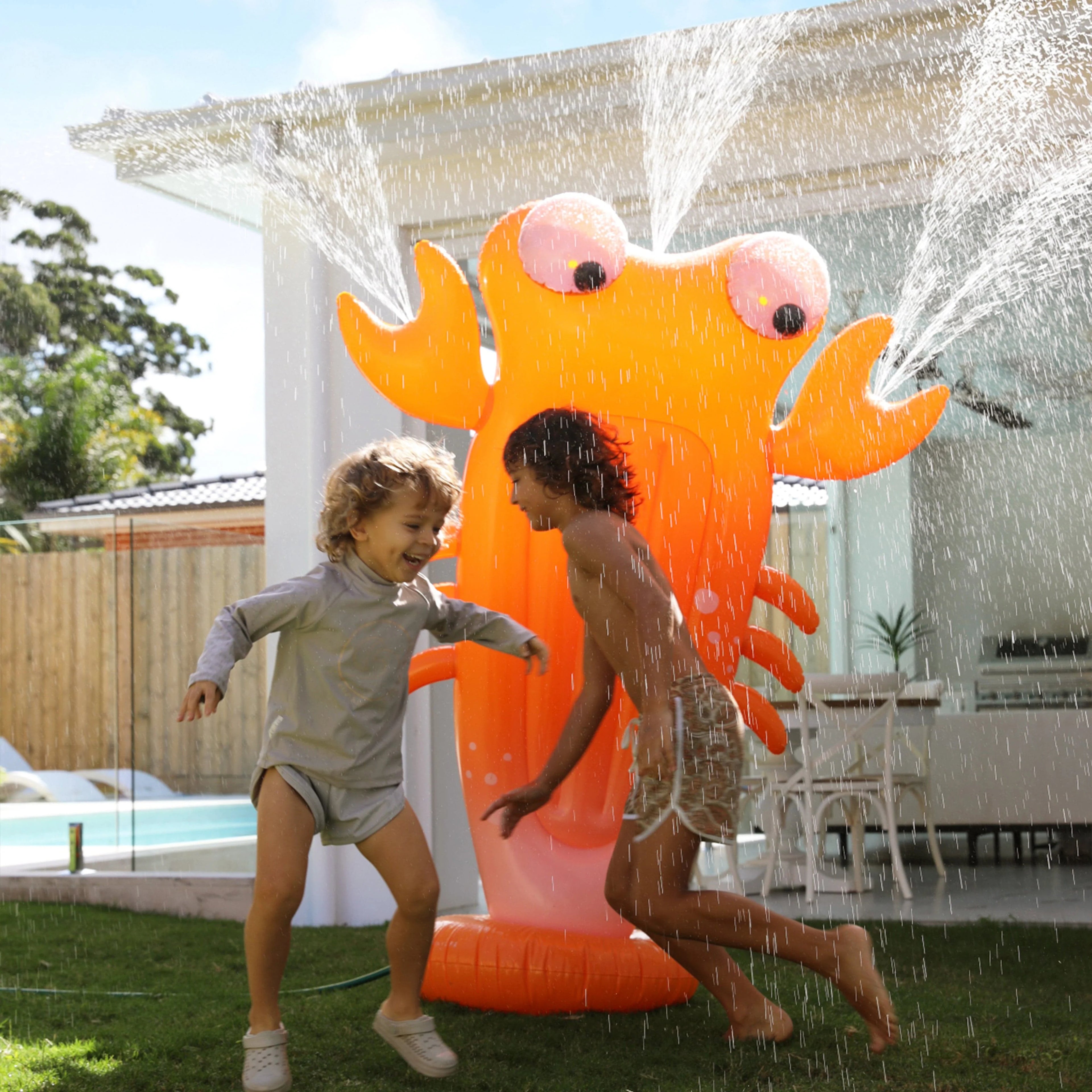 SunnyLife Orange Kids Sonny The Sea Creature Inflatable Giant Sprinkler in Orange