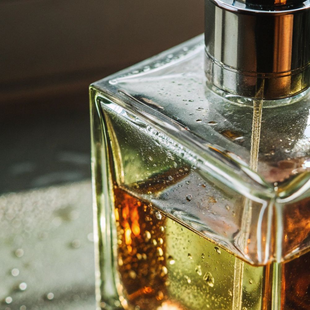Close-up of a perfume bottle with a blurred background