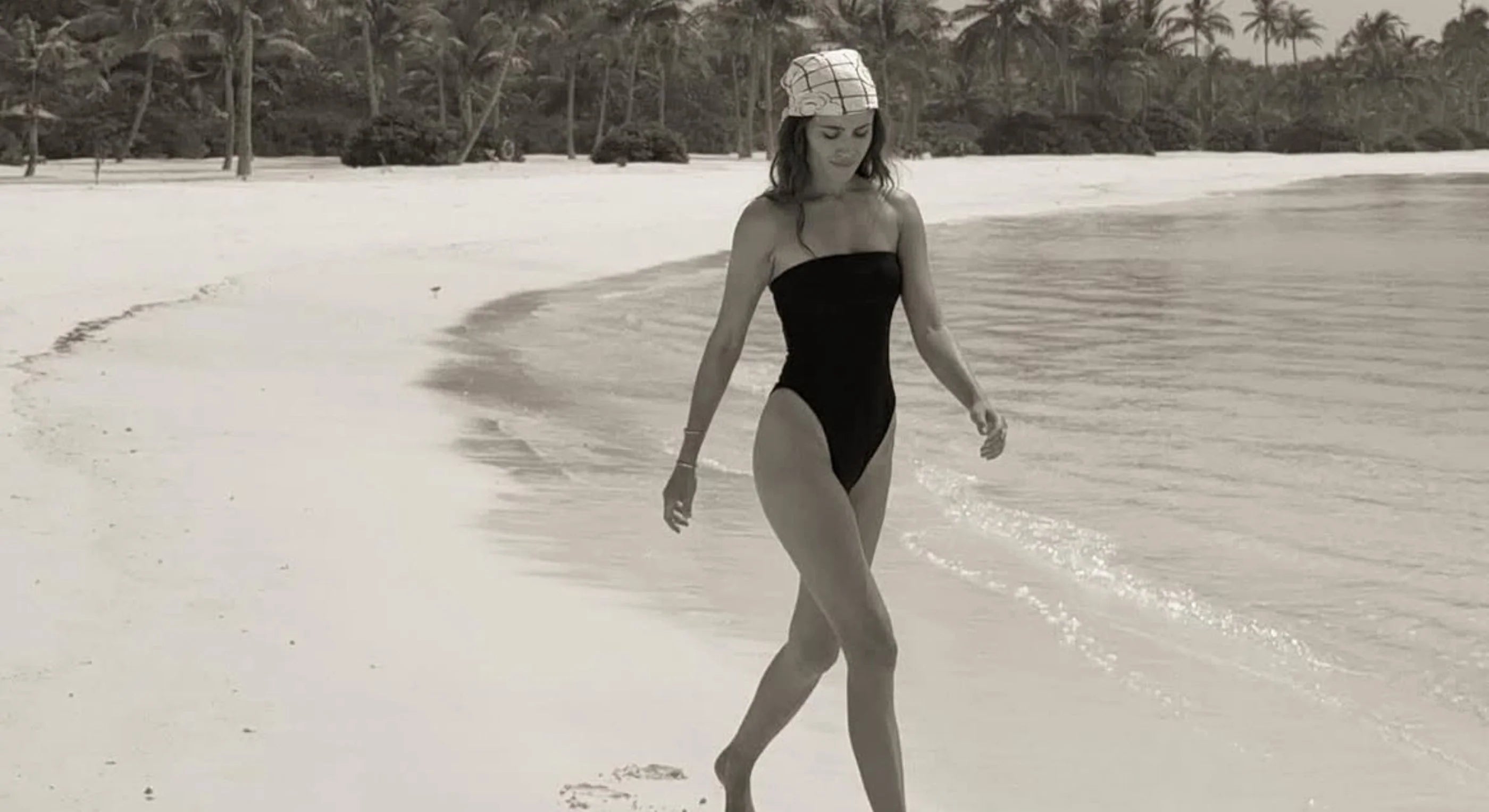 Woman walking on the beach