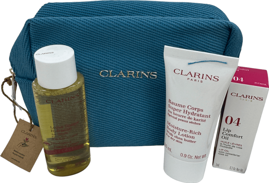 Clarins 3 - piece Travel Set With Pouch n/a - Reliked
