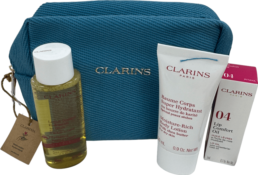 Clarins 3 - piece Travel Set With Pouch n/a - Reliked