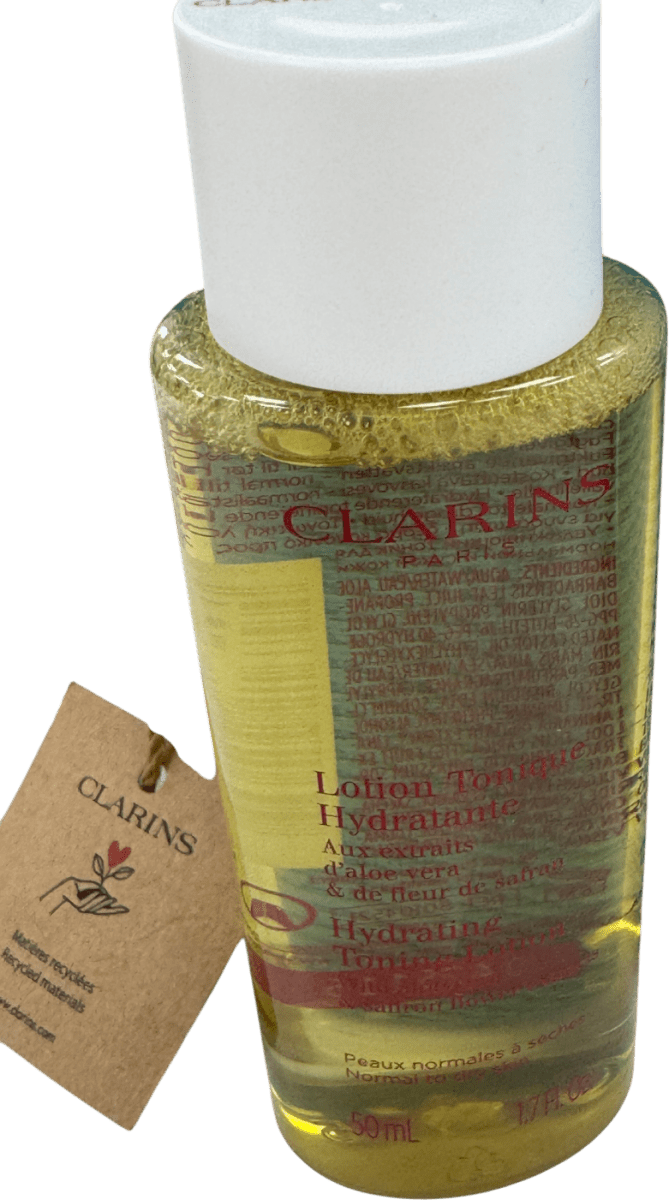 Clarins 3 - piece Travel Set With Pouch n/a - Reliked