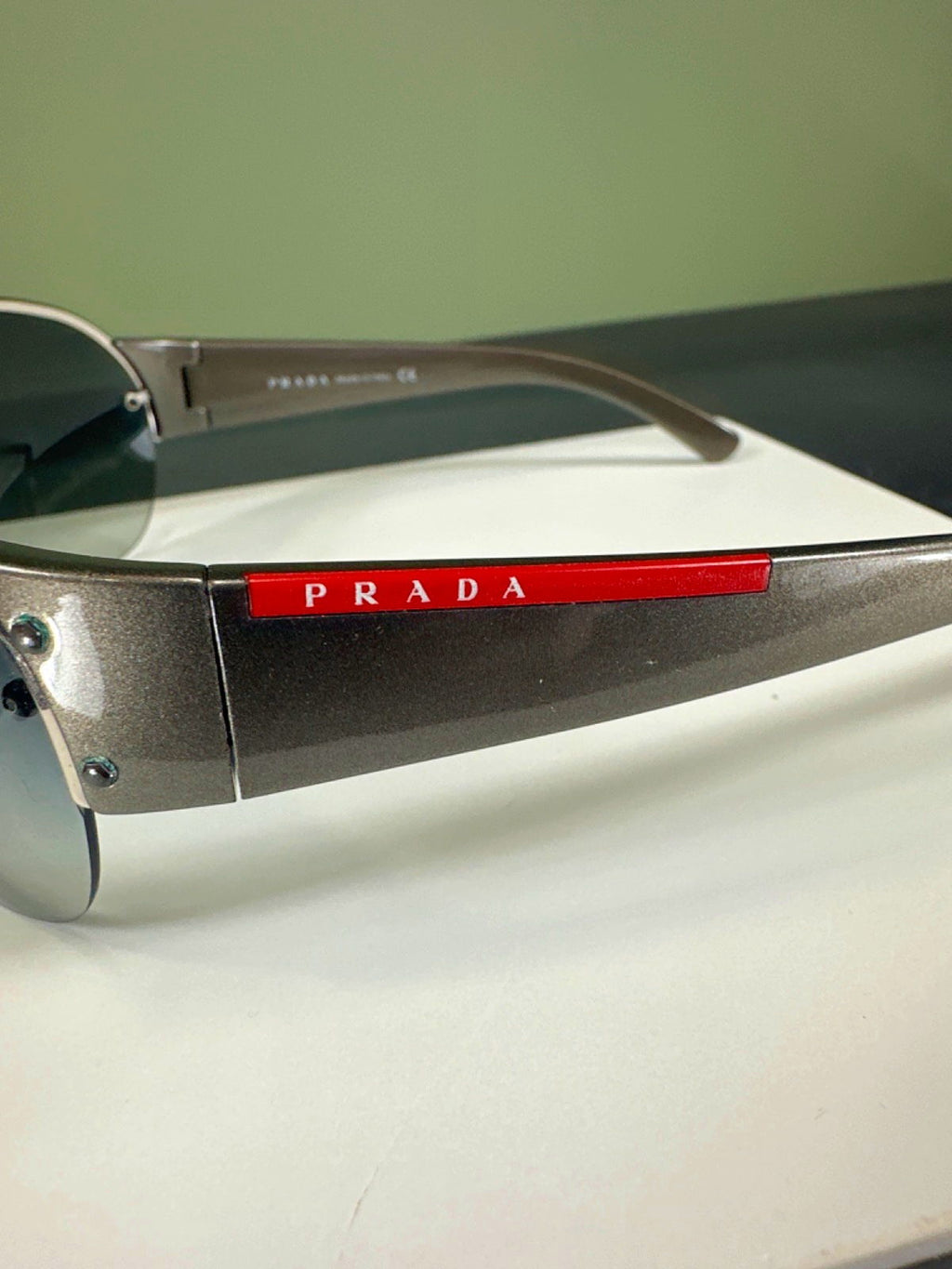 PRADA Grey Gradient Sunglasses SPS 53G in case