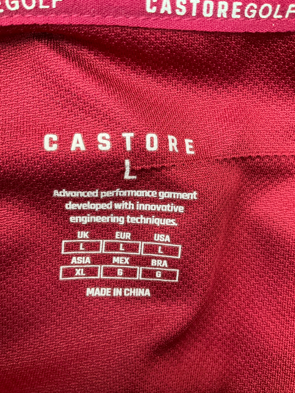 Castore Red Golf Club Essential Polo Shirt UK L