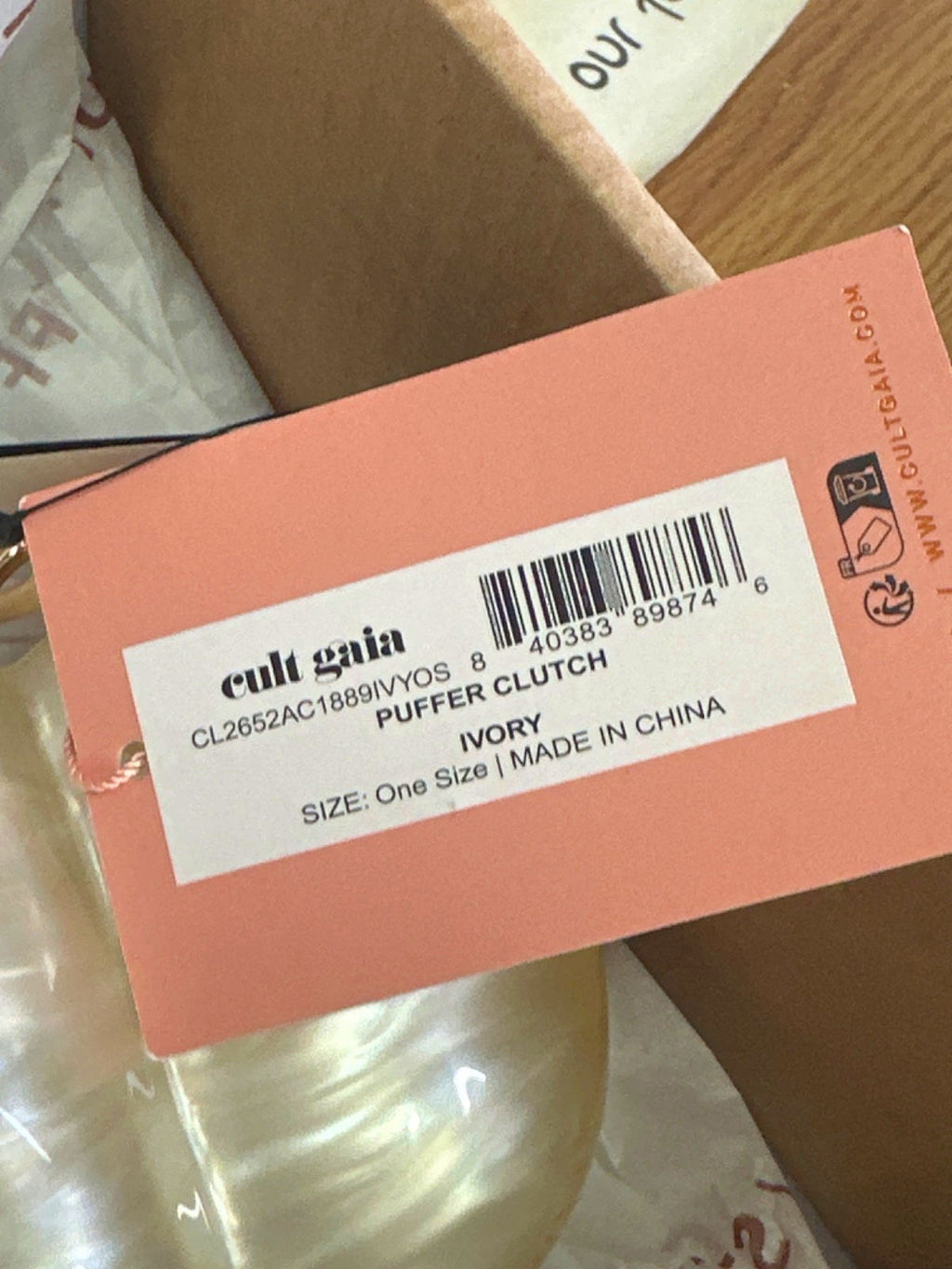 Cult Gaia Ivory Pearlescent Puffer Clutch Bag with chain strap