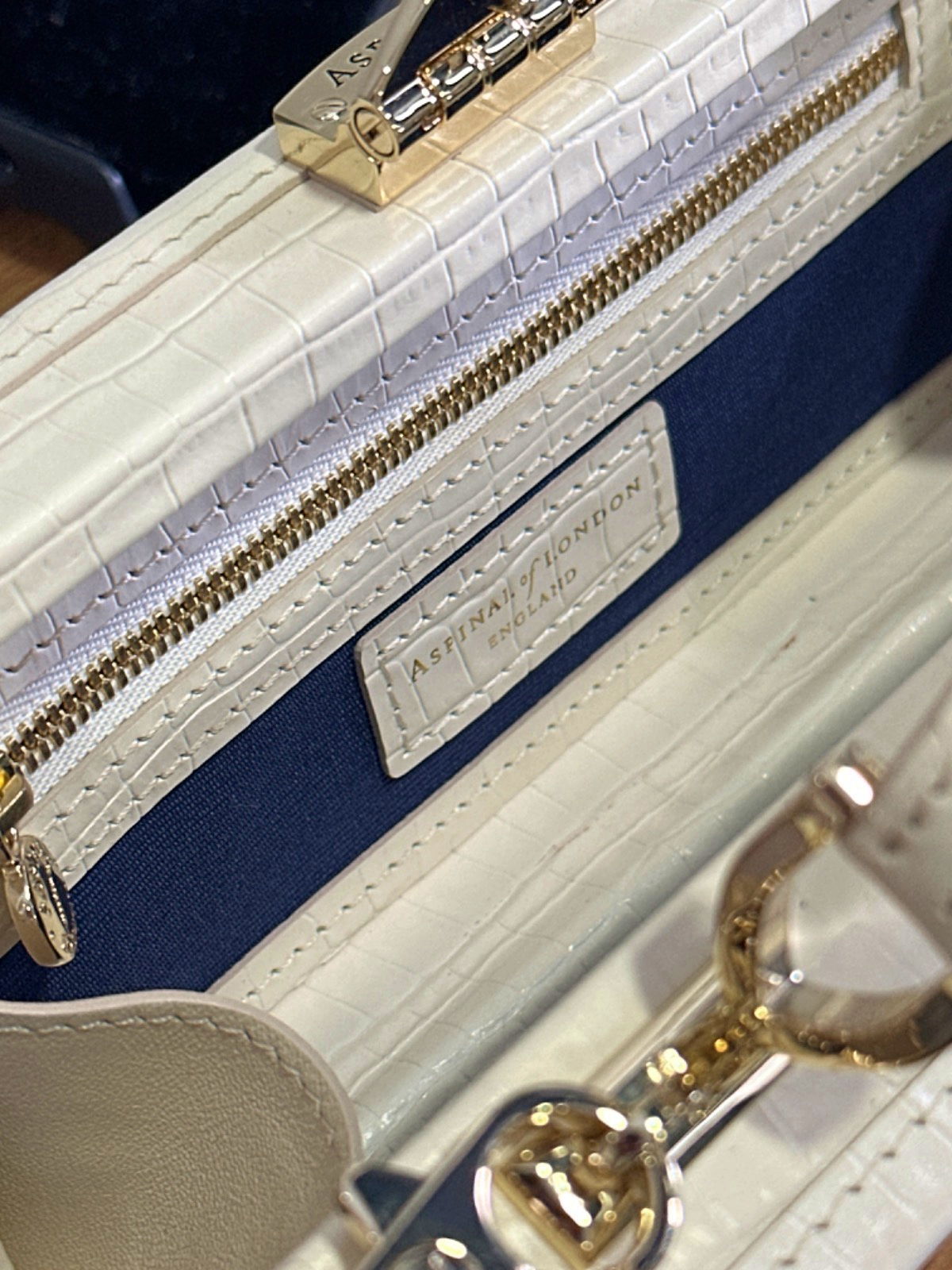 Aspinal of London Ivory Trunk Clutch Bag