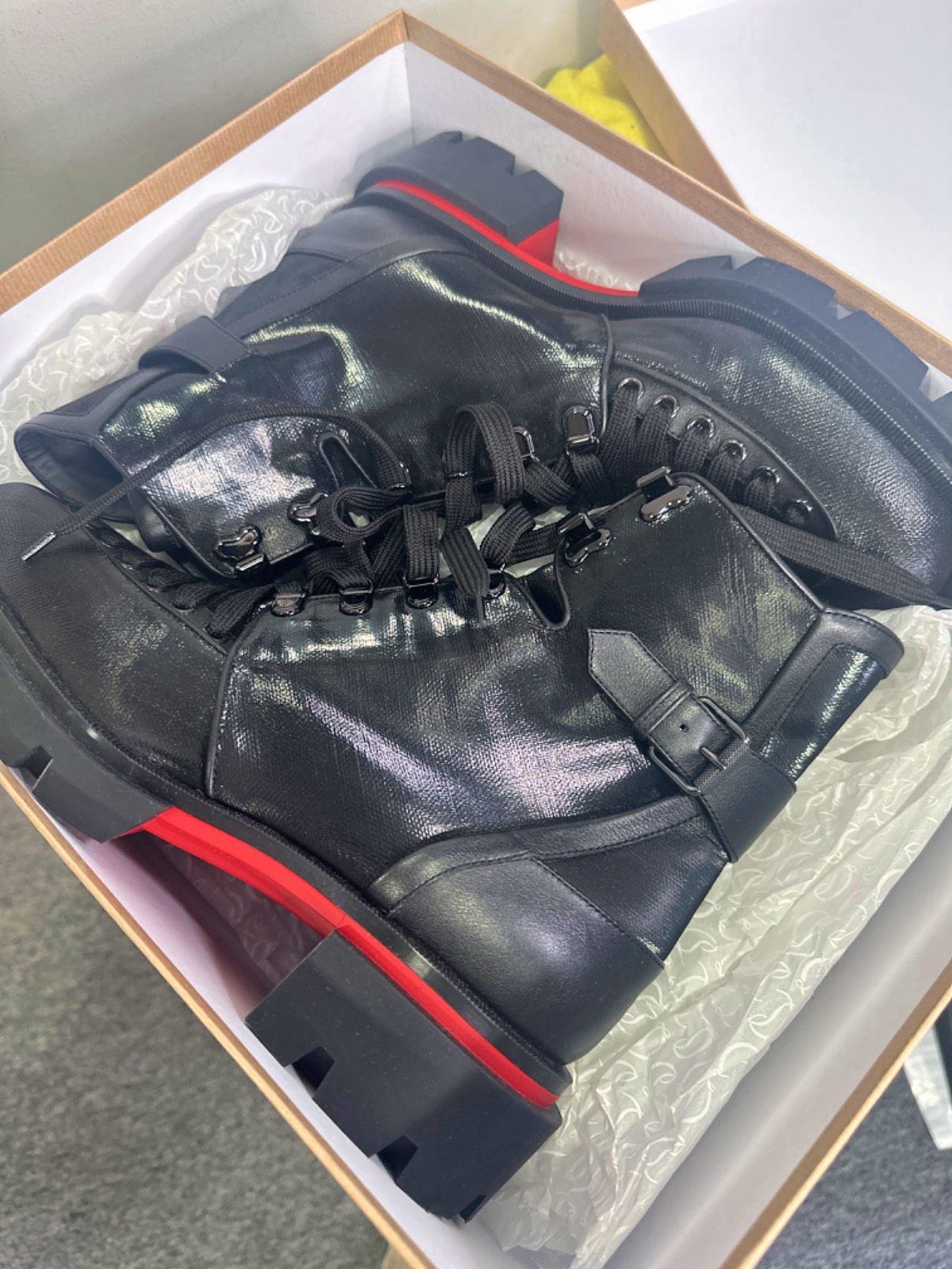 Black boots with red bottoms store
