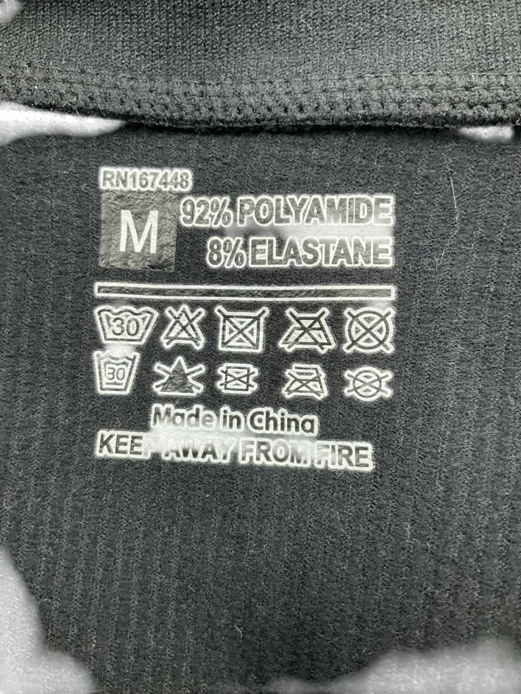 Black Ribbed Zip Front Bodysuit UK M