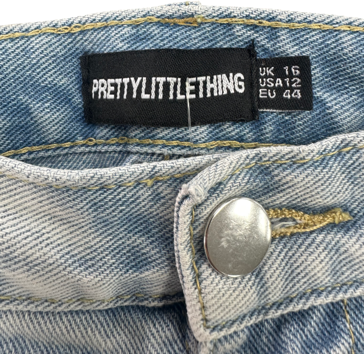 PrettyLittleThing Light Blue Wash Denim Raw Hem Hot Pants UK 16