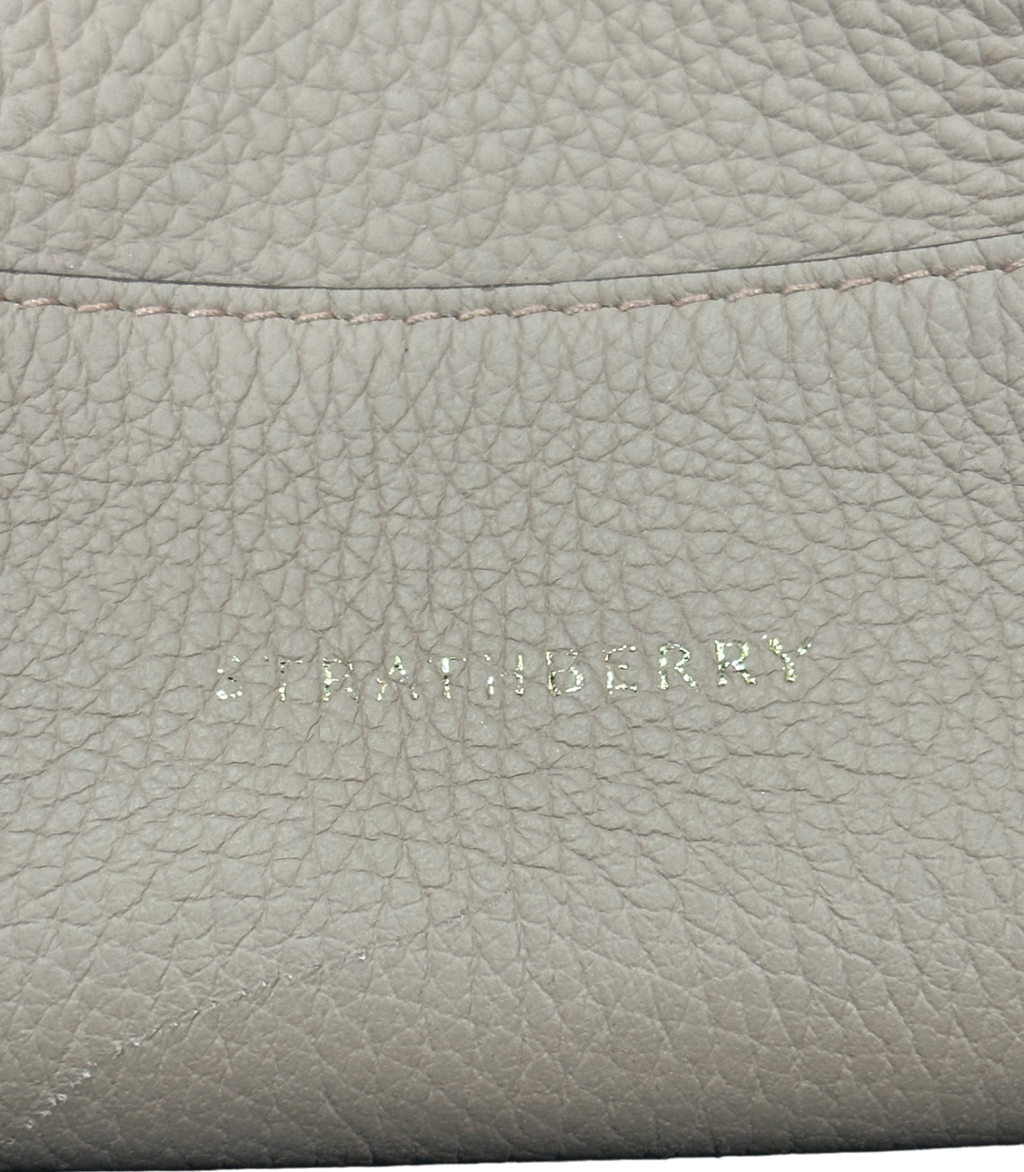 Strathberry Pink Lana Osette Midi Bucket Bag with detachable shoulder strap