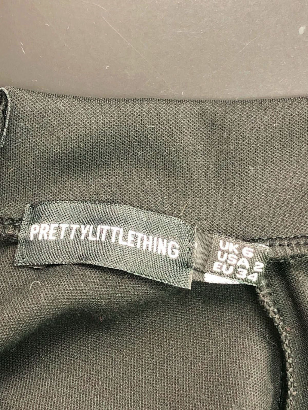 PrettyLittleThing Black Sleeveless Jumpsuit UK 6